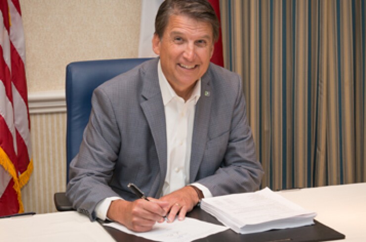 mccrory-signs-budget-091815.jpg