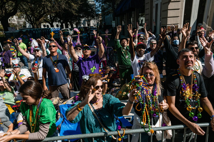 Crowds along the side of the Mardi Gras parade in New Oreans in 2022