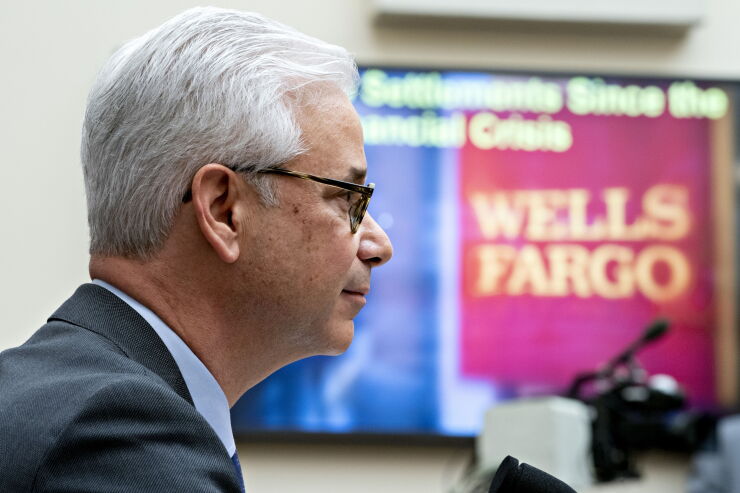 Wells Fargo CEO Charlie Scharf, seen here testifying before Congress in March, has said that resolving the bank's regulatory problems is his top priority.