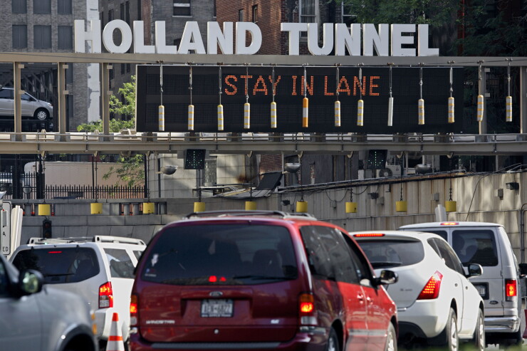 New Jersey-bound traffic enters the Holland Tunnel in New York Friday, July 07, 2006.