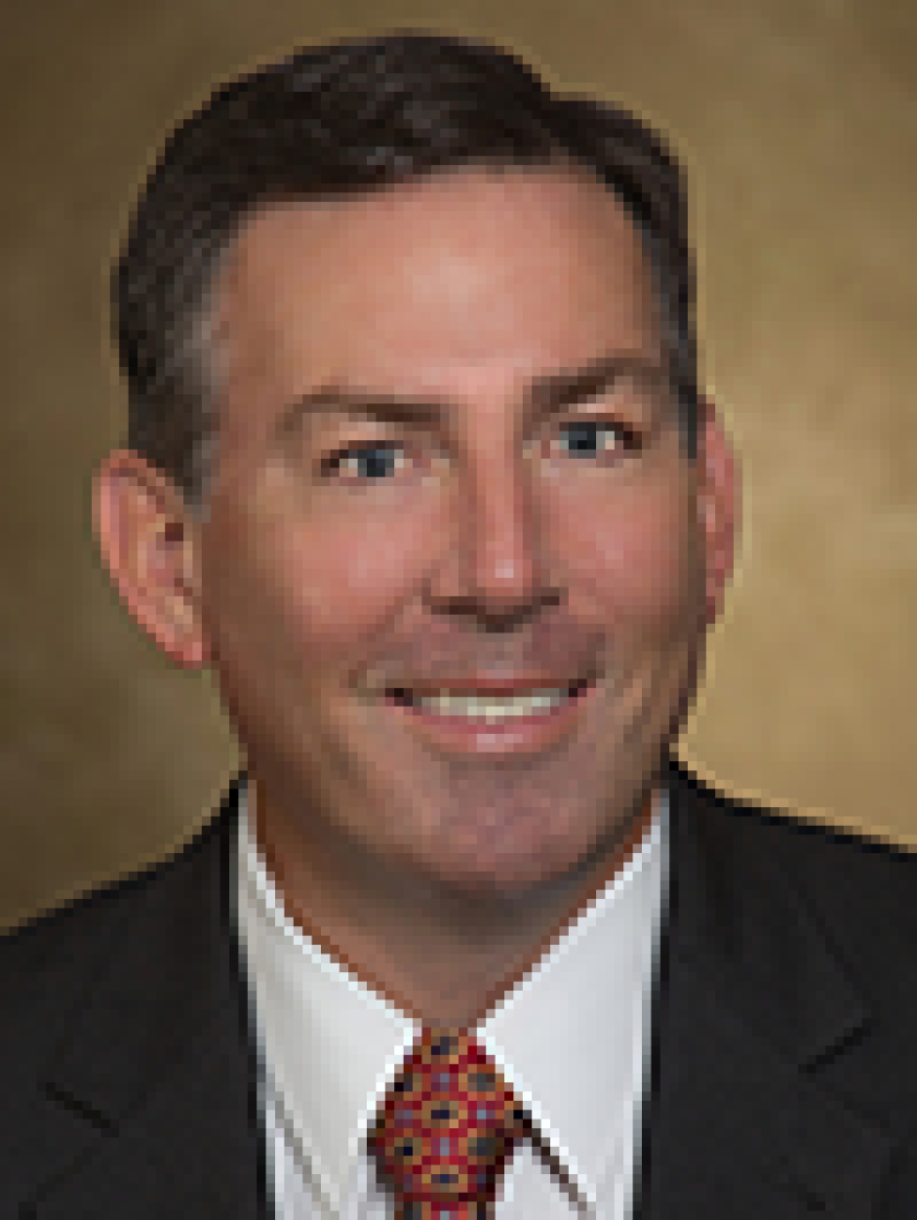 tquinn-100x133.png