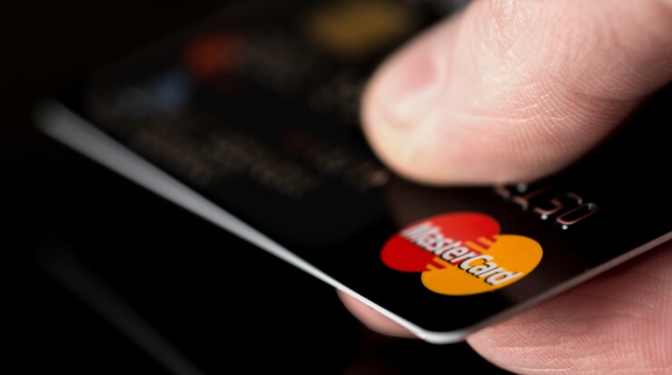 Mastercard with thumb