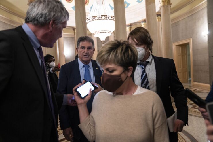 manchin-joe-senate-reporters.jpg