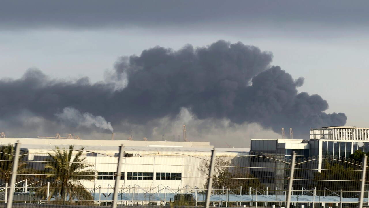Smoking rising from the Jebel Ali port in Dubai on Sunday after an Iranian missile strike.