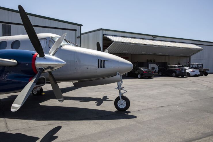 An airplane from a neighboring hanger next to the Dash Systems headquarters in Hawthorne, California, US, on Tuesday, April 19, 2022. Brimming with SpaceX engineers, Hawthorne, California, has become an unlikely focal point for a new era of manufacturing. Photographer: Alisha Jucevic/Bloomberg