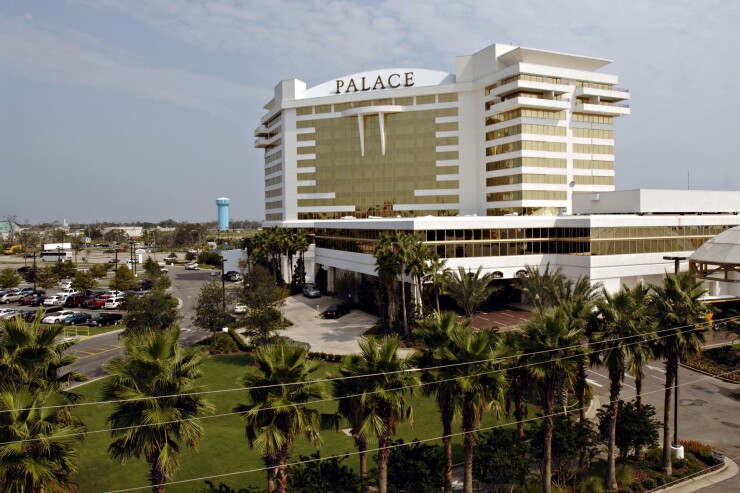 Palm trees stand outside the Palace Casino Resort in Biloxi, Mississippi in 2006, a year after Hurricane Katrina devastated the Gulf Coast.