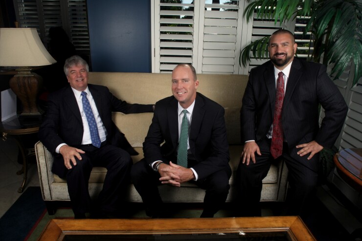 To go independent, a $175 million team picked Kestra as a partner, citing the support it provides wirehouse breakaways. “It’s a concierge level of service,” Brendan McCarthy says. Pictured from left to right: Dennis Laughlin, McCarthy and Brian Laughlin.