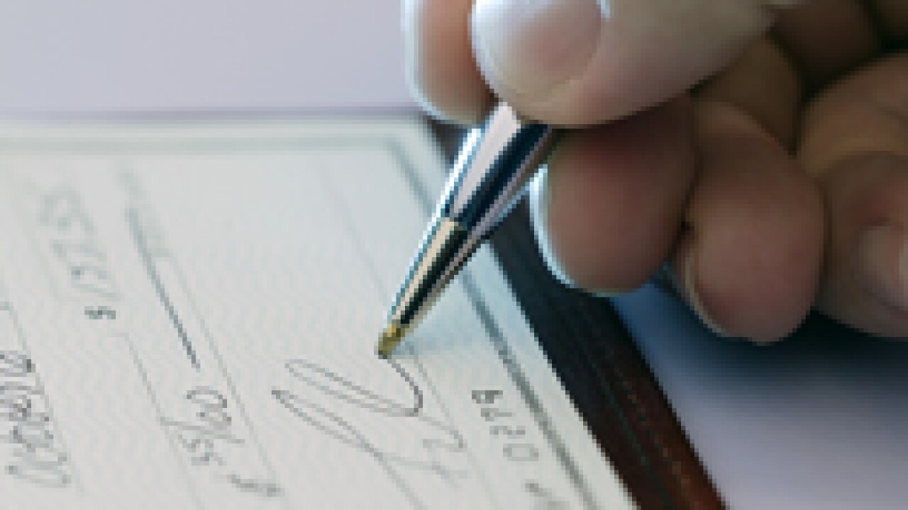 010612-signingcheck-card.jpg