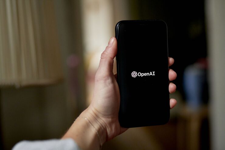 The OpenAI logo on a smartphone arranged in the Brooklyn borough of New York, US, on Thursday, Jan. 12, 2023. Microsoft Corp. is in discussions to invest as much as $10 billion in OpenAI, the creator of viral artificial intelligence bot ChatGPT, according to people familiar with its plans. Photographer: Gabby Jones/Bloomberg
