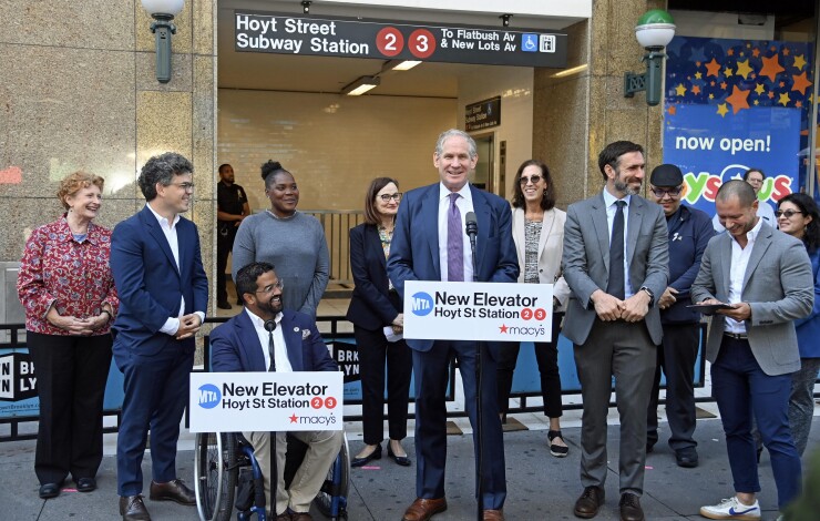 MTA Chief Accessibility Officer Quemuel Arroyo, at left podium, and MTA Chair & CEO Janno Lieber on Thursday announce a new elevator serving the Hoyt St. station.