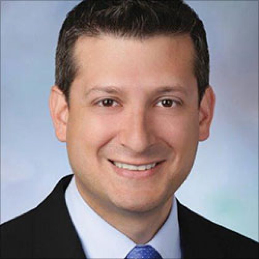 kitt-brett-greenberg-traurig-250.jpg
