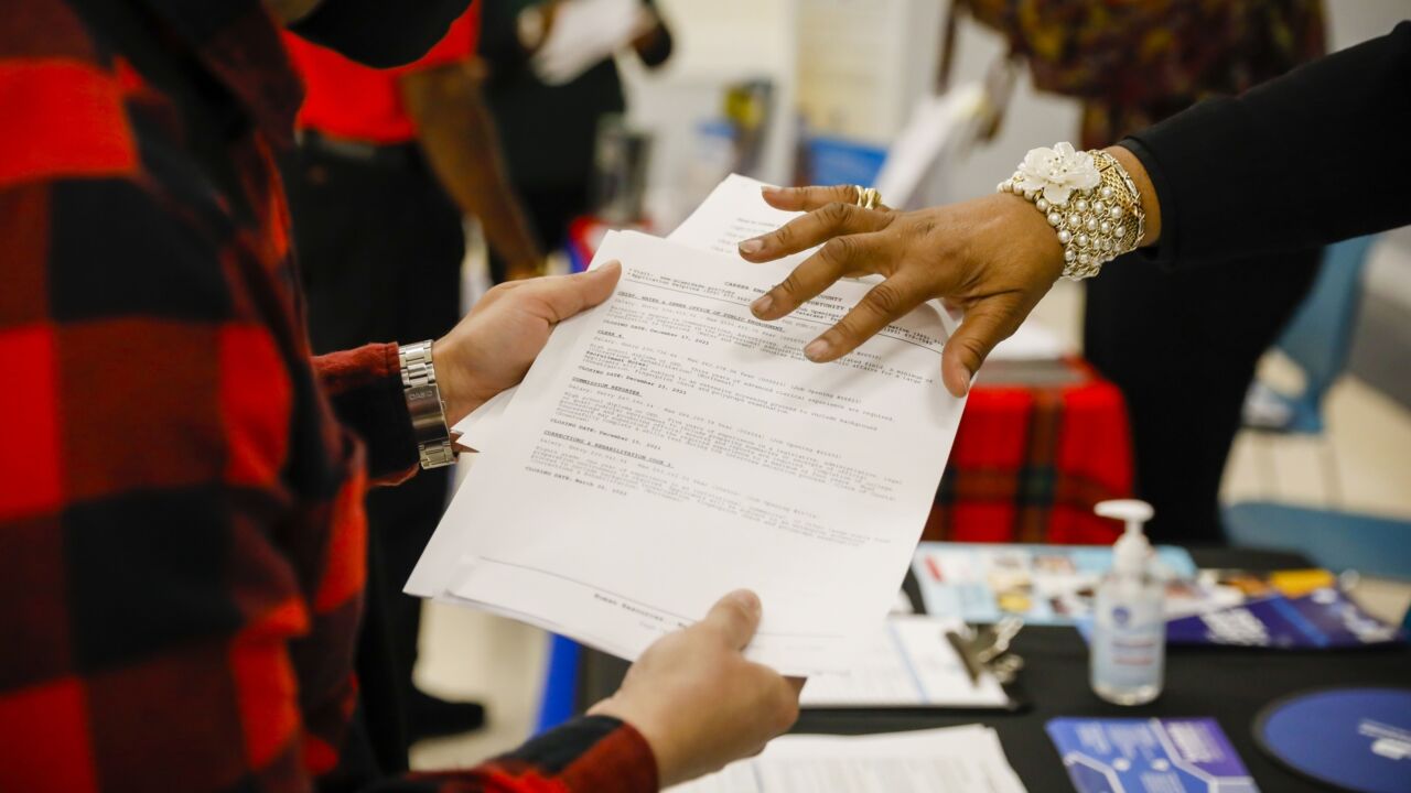 Job Seekers Attend A Miami-Dade County Career Fair