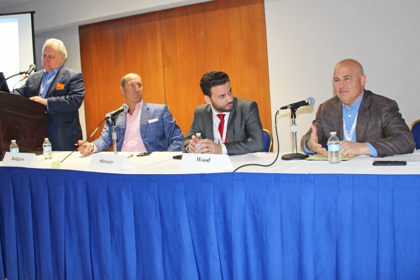 WHCC Panel - Beyond Fees - (L to R) Nelson Griswold, Mick Rodgers, John Sbrocco, Scott Wood.jpg