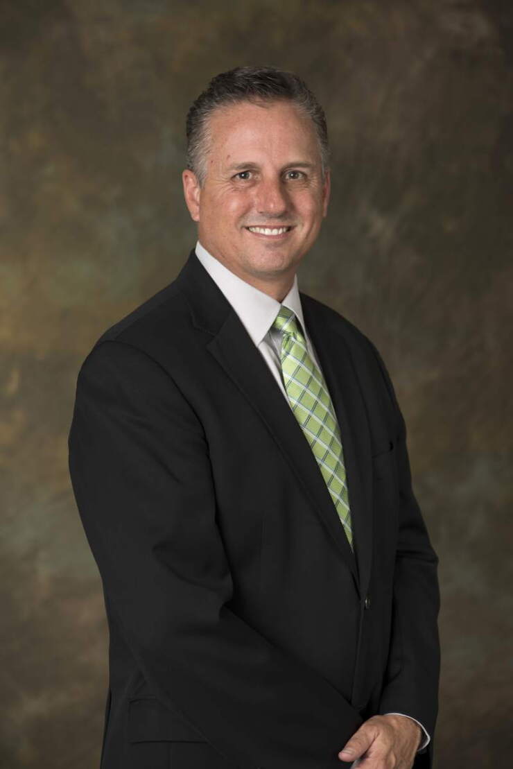Brett Martinez is CEO of Redwood CU