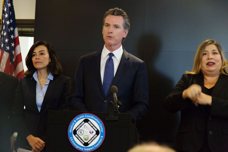 California Gov. Gavin Newsom said he is also asking banks and credit unions to waive ATM and overdraft fees for struggling customers.