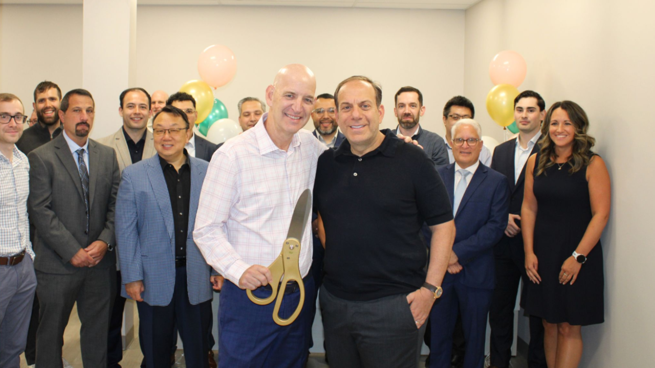 Ricky Spike Ribbon Cutting.png